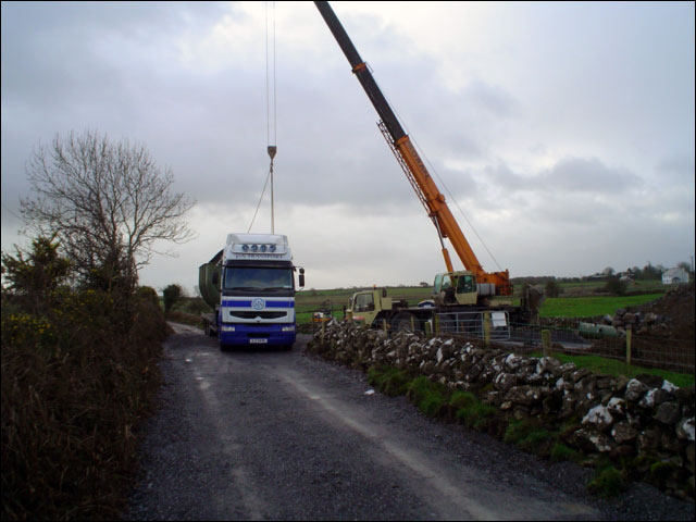 J&N Transport vehicle pictured alongside a crane