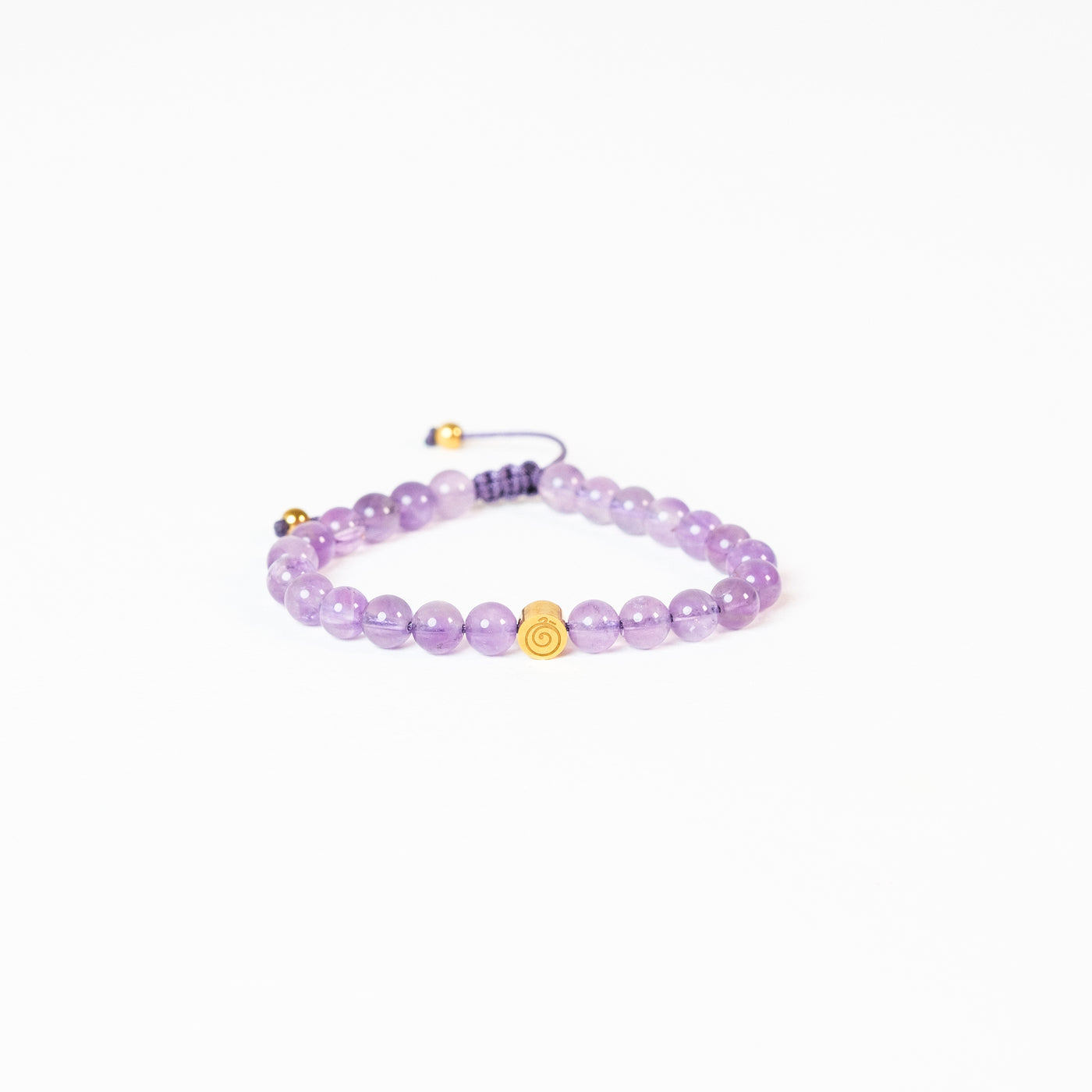 NEMDAE amethyst bracelet with its gold-coloured gratitude symbol